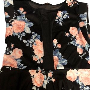 NEW WITH TAGS FLORAL BLACK DRESS with PEEKABOO PLUNGE SIZE L.